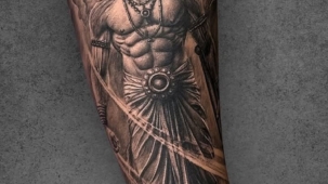 Witness the strength and divine aura of this Lord Parshuram tattoo, designed in hyper-realistic black & grey style. Every detail from the fierce expression to the sacred ornaments brings out his warrior spirit. Created at F19 Tattoo Studio, Pune – your destination for bold spiritual tattoos and custom designs.